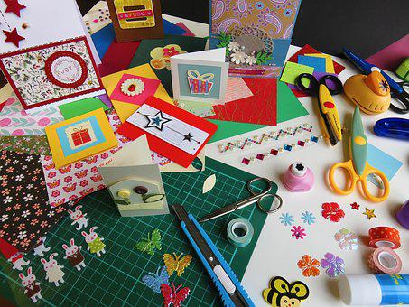 colorful greeting cards and scissors
